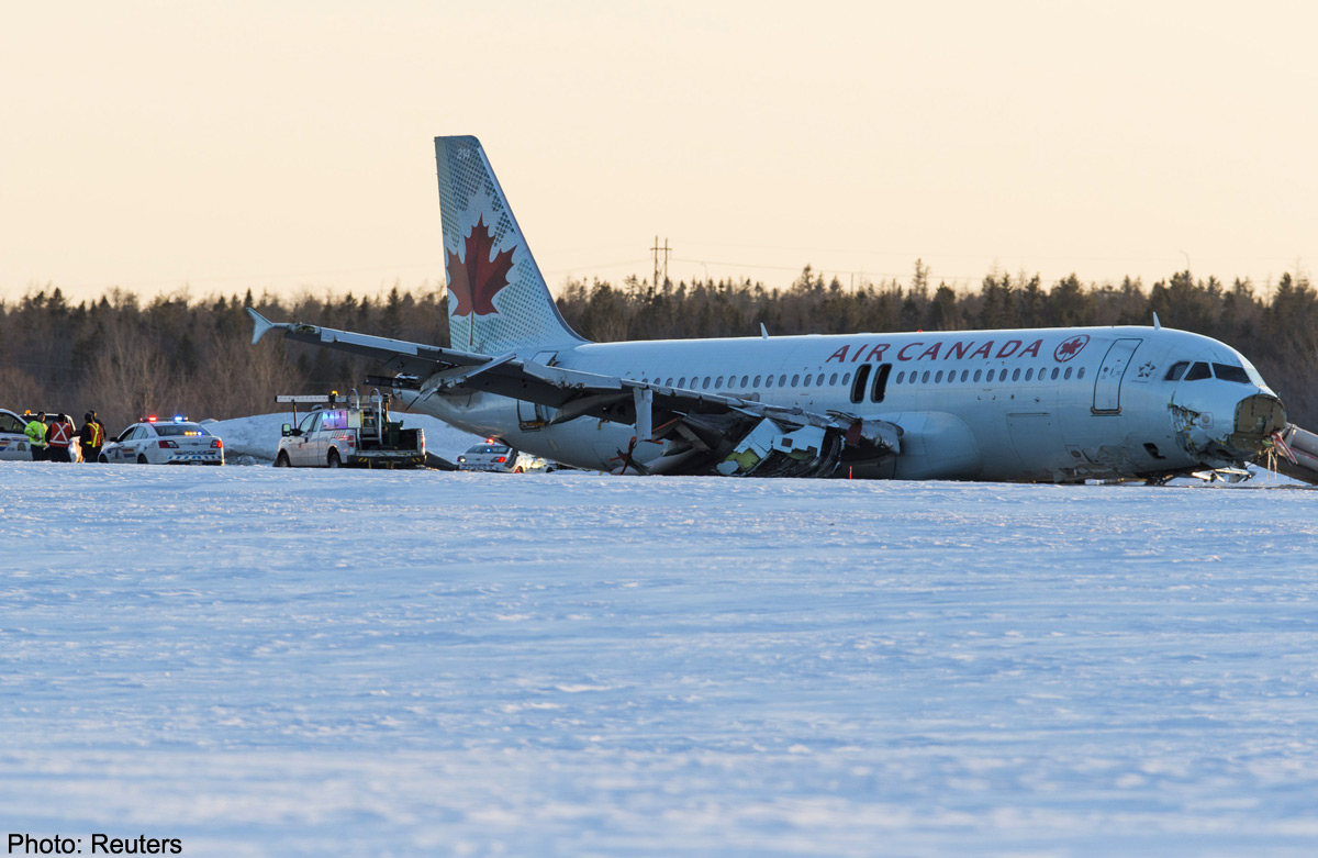 Canada air crash plane halifax nova scotia airport off flight slid runway lands injured crews a320 airbus flown which work